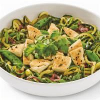 Zucchini Grilled Orange Chicken · Zucchini noodles sautéed in orange sauce with snap peas, napa and red cabbage topped with gr...
