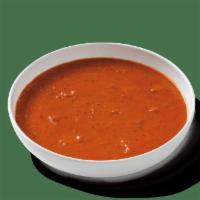 Tomato Basil Bisque · Rich and zesty tomato soup with cream, sherry, basil and garlic. Try with parmesan-crusted c...