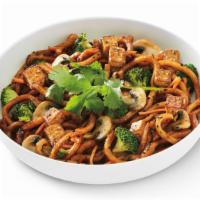 Japanese Pan Noodles With Tofu · A vegetarian favorite of caramelized udon noodles in a sweet soy sauce, seasoned tofu, brocc...