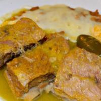 Pork Spare Ribs In Salsa Verde · Mexican tomatillo and coriander sauce.