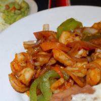 Fajitas De Camaron · shrimp fajitas. Served with rice, refried beans, guacamole and sour cream