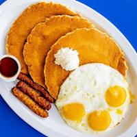 Pancake Breakfast
 · 3 fluffy pancakes, 3 eggs, and choice of bacon, sausage, or ham.