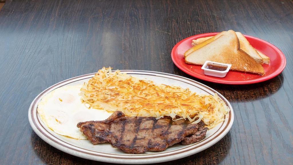 Steak & Eggs
 · 2 pieces of grilled steak. Served with 3 eggs, fresh hash browns, and toast.