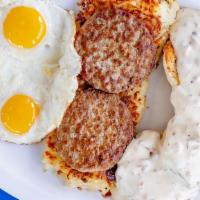 Biscuits & Gravy · 2 biscuits covered in country-style gravy, 2 sausage patties, 3 eggs, and fresh hash browns.