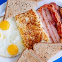 Combo Breakfast
 · 1 piece of ham, 2 bacon strips, and  2 sausage links. Served with 3 eggs, fresh hash browns,...