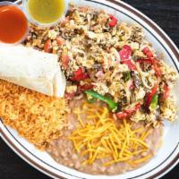 Machaca & Eggs · Shredded beef, eggs, grilled onions & bell peppers. Served with fresh Mexican rice, refried ...