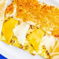 Sausage Omelette · Sausage, eggs, and melted American & Swiss cheeses. Served with fresh hash browns and toast.
