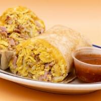Ham Breakfast Burrito · Ham, fresh hash browns, eggs, and melted shredded cheese wrapped in a flour tortilla.