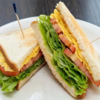 Egg Sandwich · Eggs, lettuce, tomato, and mayo on the toast of your choice.