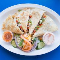 Quesadilla · Flour tortilla filled with melted cheddar cheese, bell peppers, grilled onions, and choice o...