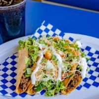 3 Ground Beef Tacos Special · 3 hard-shell tacos filled with ground beef, lettuce, pico de gallo, melted shredded cheese, ...