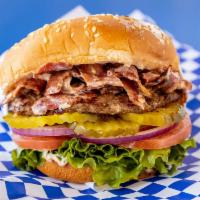 Colossal Burger · Sesame seed bun, hamburger patty, juicy pastrami, lettuce, tomato, red onions, pickles, and ...