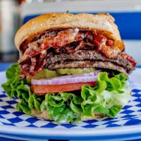 Double Colossal Burger · Sesame seed bun, 2 hamburger patties, juicy pastrami, lettuce, tomato, red onions, pickles, ...