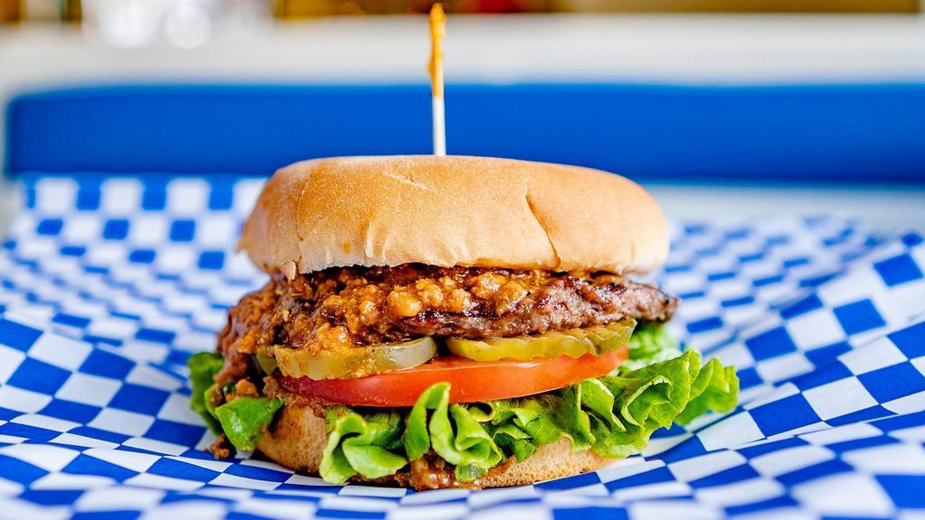 Junior Chili Burger · Junior bun, hamburger patty, fresh chili, lettuce, tomato, pickles and our signature 1000 Island dressing. Perfect for kids.