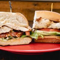 Chicken Sandwich · Grilled chicken breast, Swiss cheese, lettuce, tomato, and mayo on a French roll.