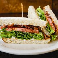 Blt · Crispy bacon, lettuce, tomato, and mayo on the toast of your choice.