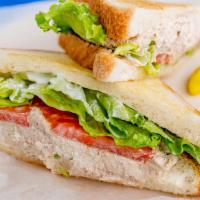 Tuna Sandwich · Tuna, lettuce, tomato, and mayo on the toast of your choice.