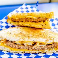 Patty Melt · Hamburger patty, grilled white onions, and 2 slices of melted cheese on rye bread.