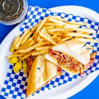 Pastrami Sandwich Combo · Juicy pastrami, mustard, and pickles on a French roll. Comes with French fries and a drink.
...
