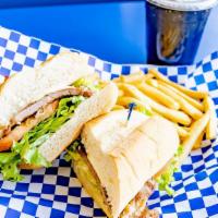 Steak Sandwich Combo · Ribeye steak, melted Swiss cheese, lettuce, tomato, and mayo on a French roll. Comes with Fr...