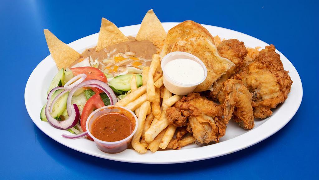 Fried Chicken Dinner · 4 pieces of fried chicken. Served with our fresh Mexican rice, refried beans, French fries, a small green salad, and choice of a bread side.