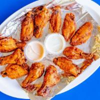 12 Wings · 12 homemade chicken wings. Choice of BBQ or spicy Buffalo sauce.