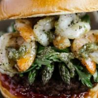 Surf & Turf Burger With Shrimp · Beef burger, topped with garlic jumbo shrimp (4) , roasted garlic butter, sweet chili sauce,...