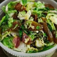 Shaved Brussels Sprouts · Bacon & caramelized onions.