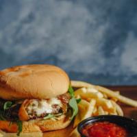 Butcher’S Burger With Fries · Aged Angus Beef with Swiss cheese, Garlic aioli, Sun dried tomatoes, arugula, and caramelize...