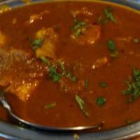 Fish Curry · Boneless fish cubes in spicy gravy.