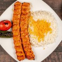 Chicken Koobideh · One skewer of grilled, juicy, and seasoned ground chicken. Served with grilled tomato, basma...