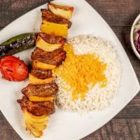 Shish Kabob · Grilled, juicy, large chunks of beef marinated in our special sauce and skewered with onions...