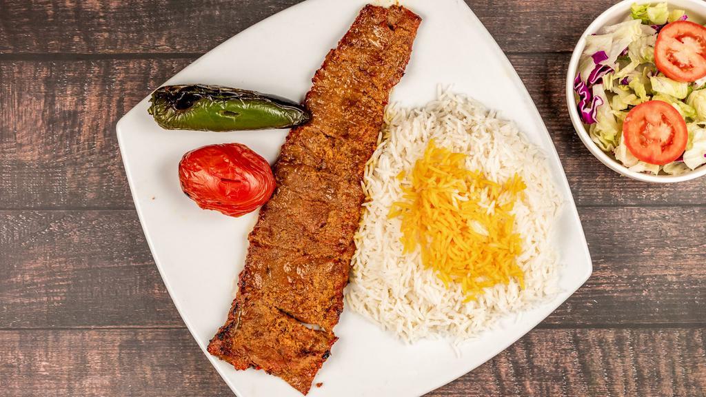 Barg Kabob · Our finest cut of grilled fillet mignon marinated in our special sauce. Served with grilled tomato, basmati rice, and salad.