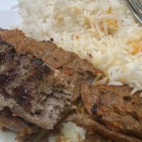 Soltani · A combination of grilled fillet mignon and seasoned ground beef. Served with grilled tomato,...