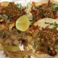 Mexican Street Taco · Meat, cilantro, onion, & salsa