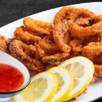 Fried Calamari · Lightly battered calamari served with our sweet and sour sauce.