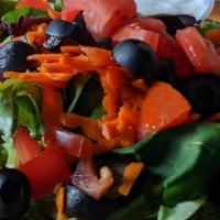 House Salad · Vegan. Gluten free.  Full house salad with greens, olives, tomatoes and shredded carrots wit...