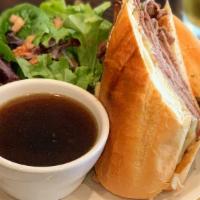 French Dip · Roast beef and swiss on a French roll with a side of au jus. Comes with side of regular frie...
