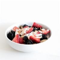 Chia With Seasonal Fruit · our house-made chia pudding topped with seasonal fresh fruit, coconut, almond, and honey.