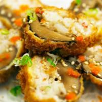 Stuffed Mushrooms · Crispy battered shiitake mushrooms stuffed with scallop and crab salad. Topped with masago, ...