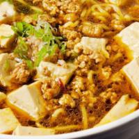 Mabo Ramen · Hot. Ramen in a spicy shoyu based broth. Topped with stir-fried minced pork, tofu, and green...