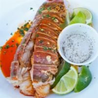 Lobster Tail  · Juicy 6 ounces lobster tail covered in one of our savory sauces and spice level of your choi...
