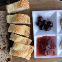 Baker Bread Basket · Includes butter, jam, kalamata olives, and feta cheese.