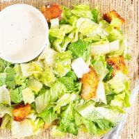 Traditional Caesar · Chopped romaine and Parmesan cheese tossed in caesar dressing, topped with our housemade cro...