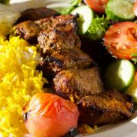 Shish Kebab · Juicy marinated chunk of filet mignon broiled on open fire.