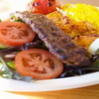 Combo Kebab · 1 skewer of chicken and 1 beef koobideh kebab. Served with hummus, garlic sauce, and choice ...
