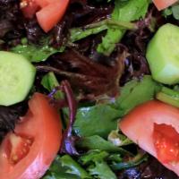 House Salad · Mixed greens, tomatoes, cucumber, and balsamic vinaigrette.