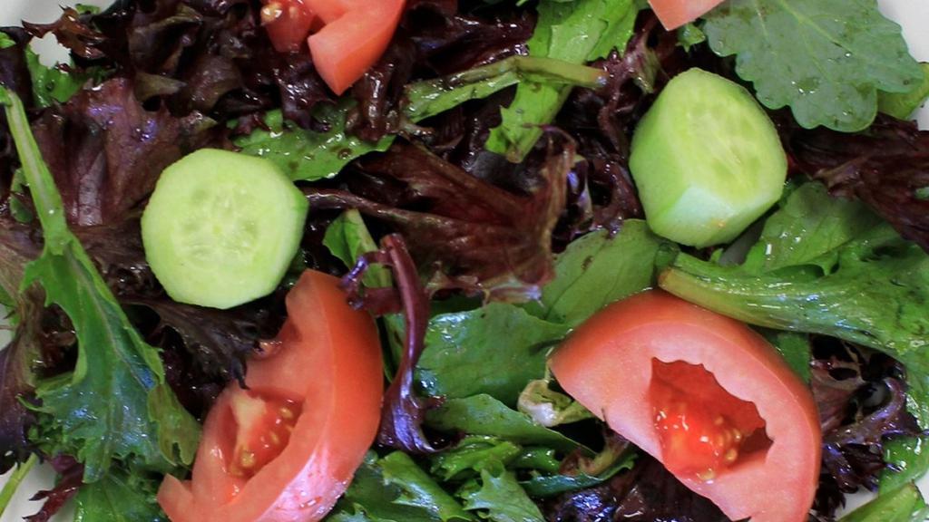 House Salad · Mixed greens, tomatoes, cucumber, and balsamic vinaigrette.