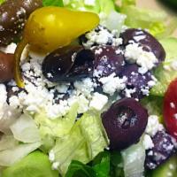 Greek Salad · Romaine lettuce, tomato, cucumber, onion, feta cheese, Kalamata olives, and balsamic vinaigr...