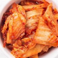 Kimchi · Traditional Korean side dish of salted and fermented napa cabbage, radish, gochugaru, onions...